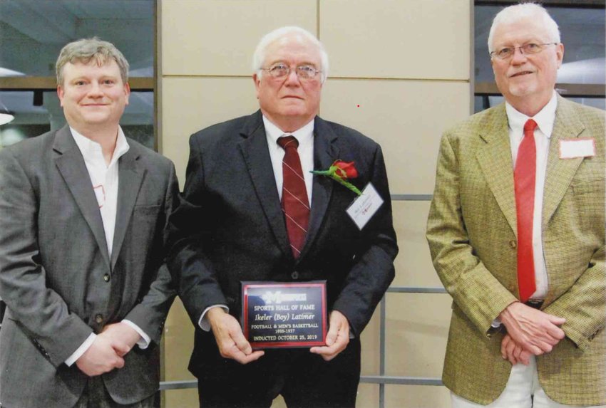 Mr. Ike L. Latimer, the son of the late Ikeler M. “Boy” Latimer, is flanked by the senior’s grandson Spence I. Latimer, left, and brother William L. Latimer, right. This photo was taken following EMCC’s 2019 Sports Hall of Fame induction banquet in which the late Mr. Ikeler M. “Boy” Latimer was posthumously inducted.